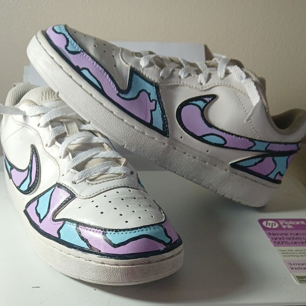 Nike Artistic White Sneakers with Purple and Blue Accents